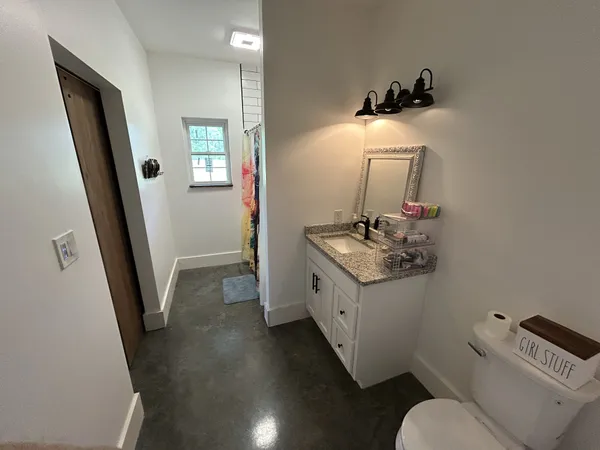 a bathroom with sink and mirror