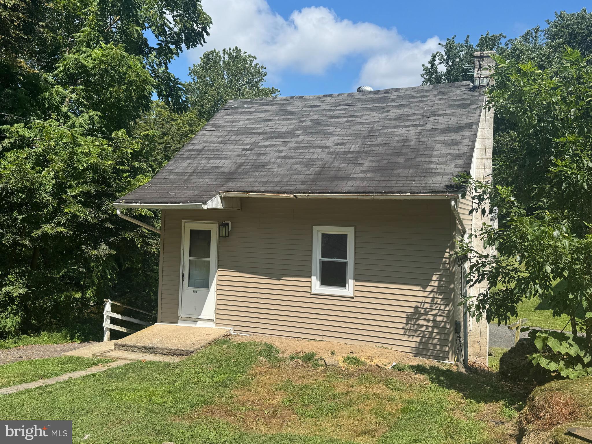3145 Zepp Road Green Lane, PA 18054 - Photo 2 of 8 a view of a house with a yard
