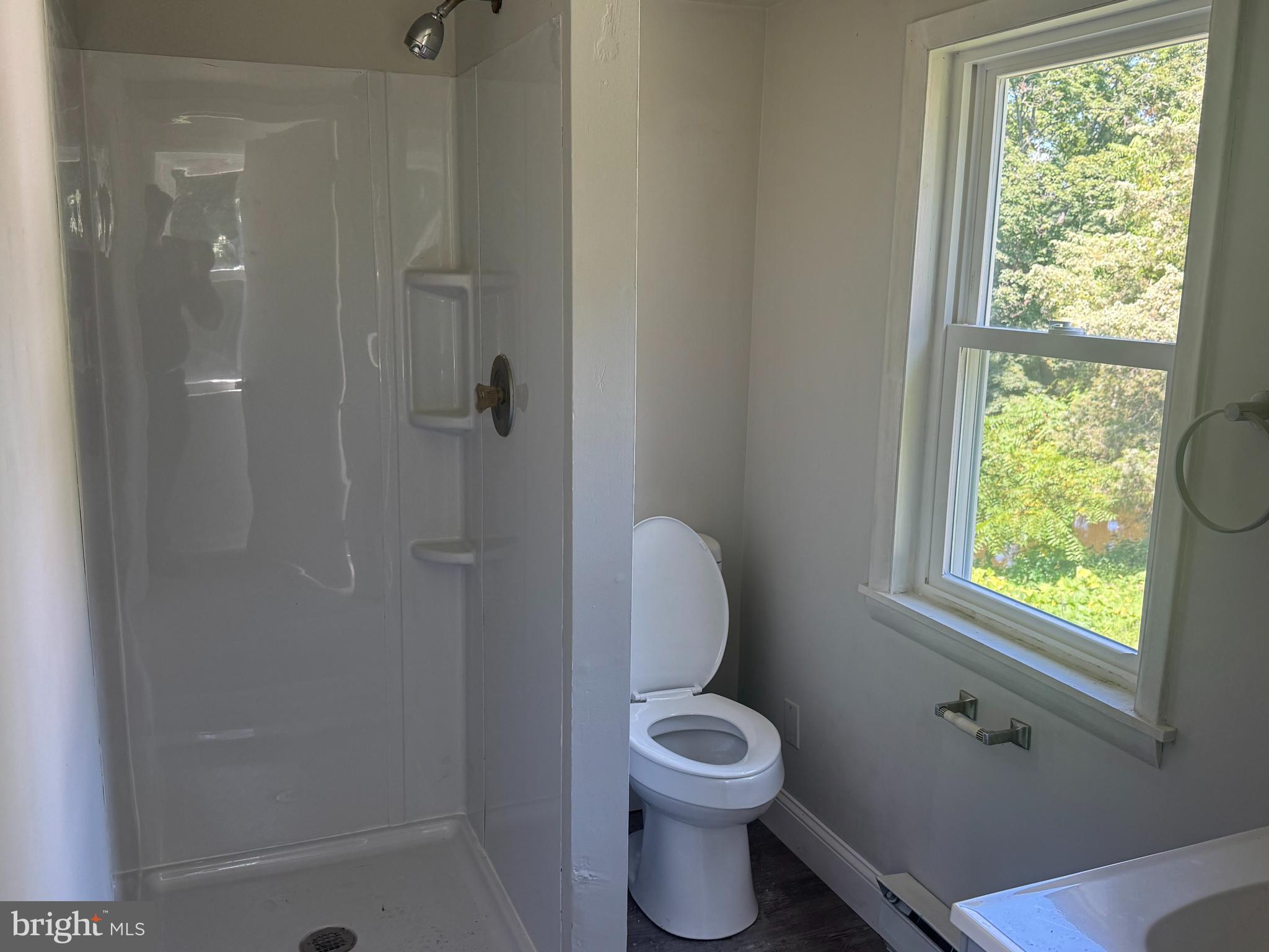 3145 Zepp Road Green Lane, PA 18054 - Photo 8 of 8 a white toilet sitting next to a bathroom sink