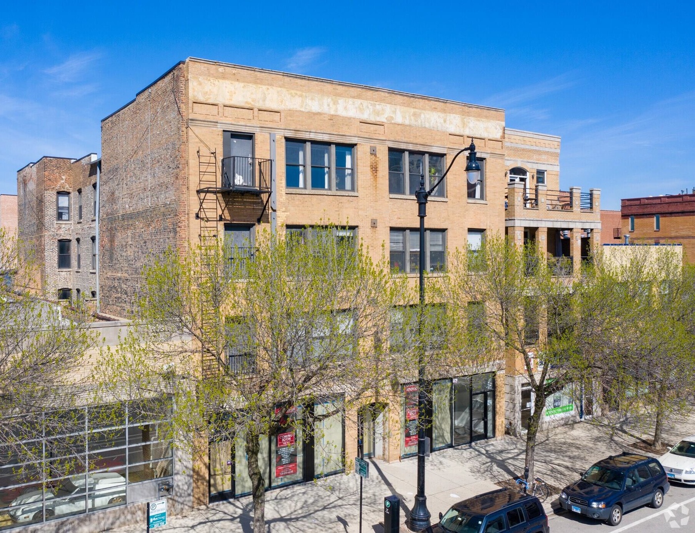 a front view of a building with glass windows
