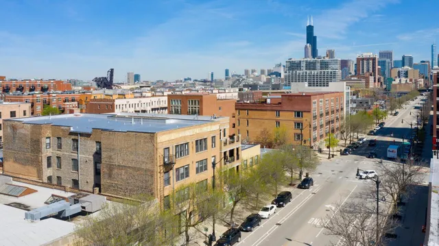 a view of a city with tall buildings