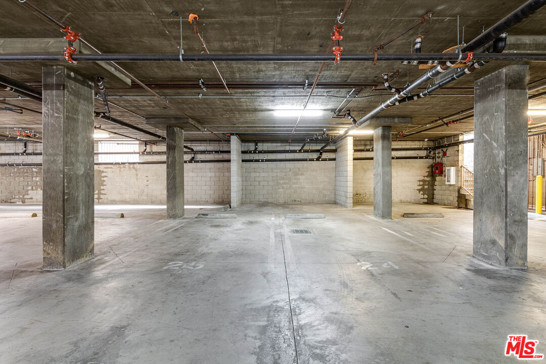14735 Friar Street, Unit 113 Van Nuys, CA 91411 - Photo 16 of 16 a view of empty room with wooden floor