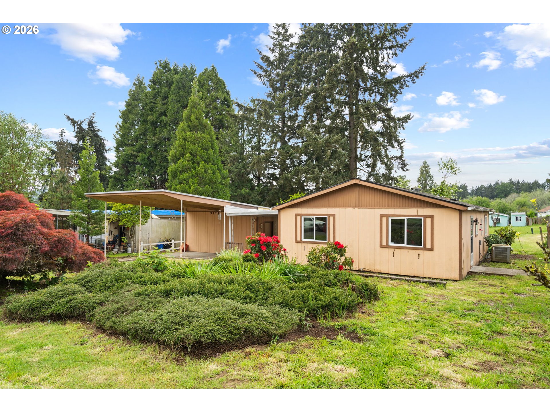9175 Southwest Link Drive Cornelius, OR 97113 - Photo 1 of 30 a front view of a house with a yard