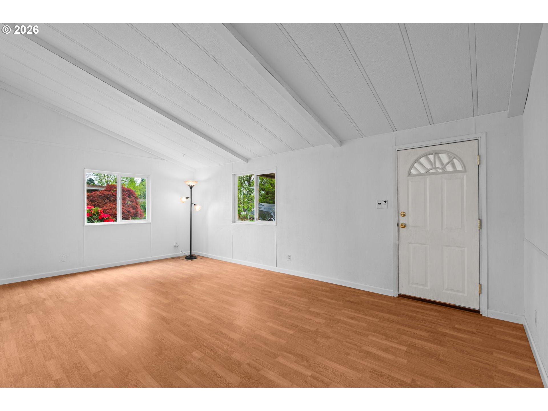 9175 Southwest Link Drive Cornelius, OR 97113 - Photo 5 of 30 a view of an empty room with wooden floor