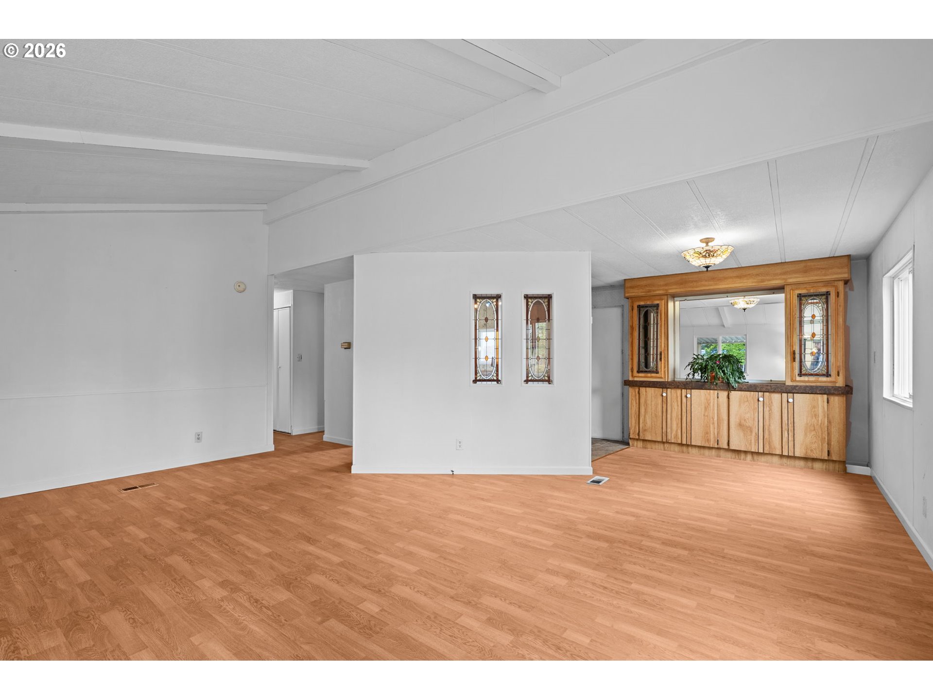 9175 Southwest Link Drive Cornelius, OR 97113 - Photo 8 of 30 a view of empty room with wooden floor and windows