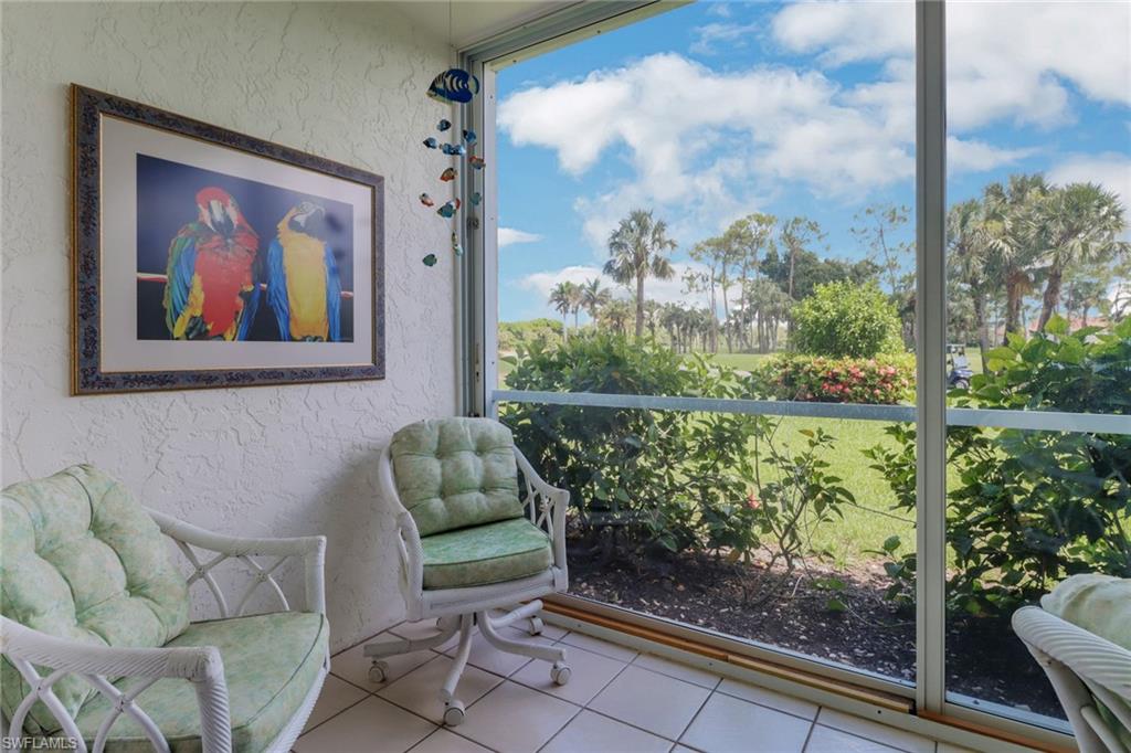 4556 Andover Way, Unit E106 Naples, FL 34112 - Photo 29 of 40 View of sunroom