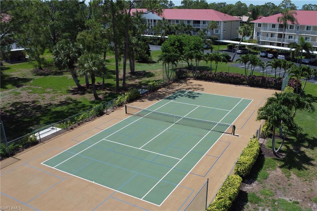 4556 Andover Way, Unit E106 Naples, FL 34112 - Photo 34 of 40 View of tennis court