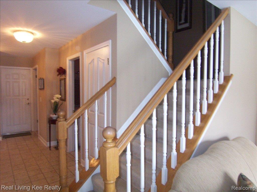 1899 Burning Bush Court, Unit 168 Rochester, MI 48309 - Photo 11 of 25 Staircase