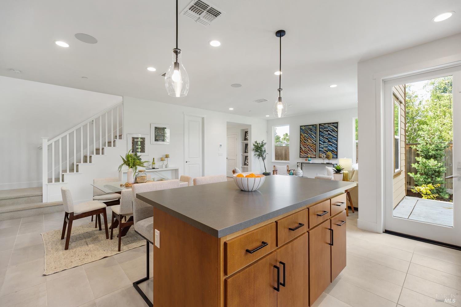 1201 Del Rancho Way Petaluma, CA 94954 - Photo 12 of 56 a kitchen with a table chairs and a sink