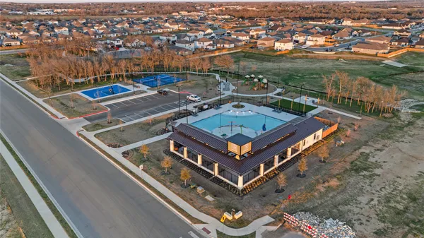 an aerial view of a residential apartment building with a outdoor space