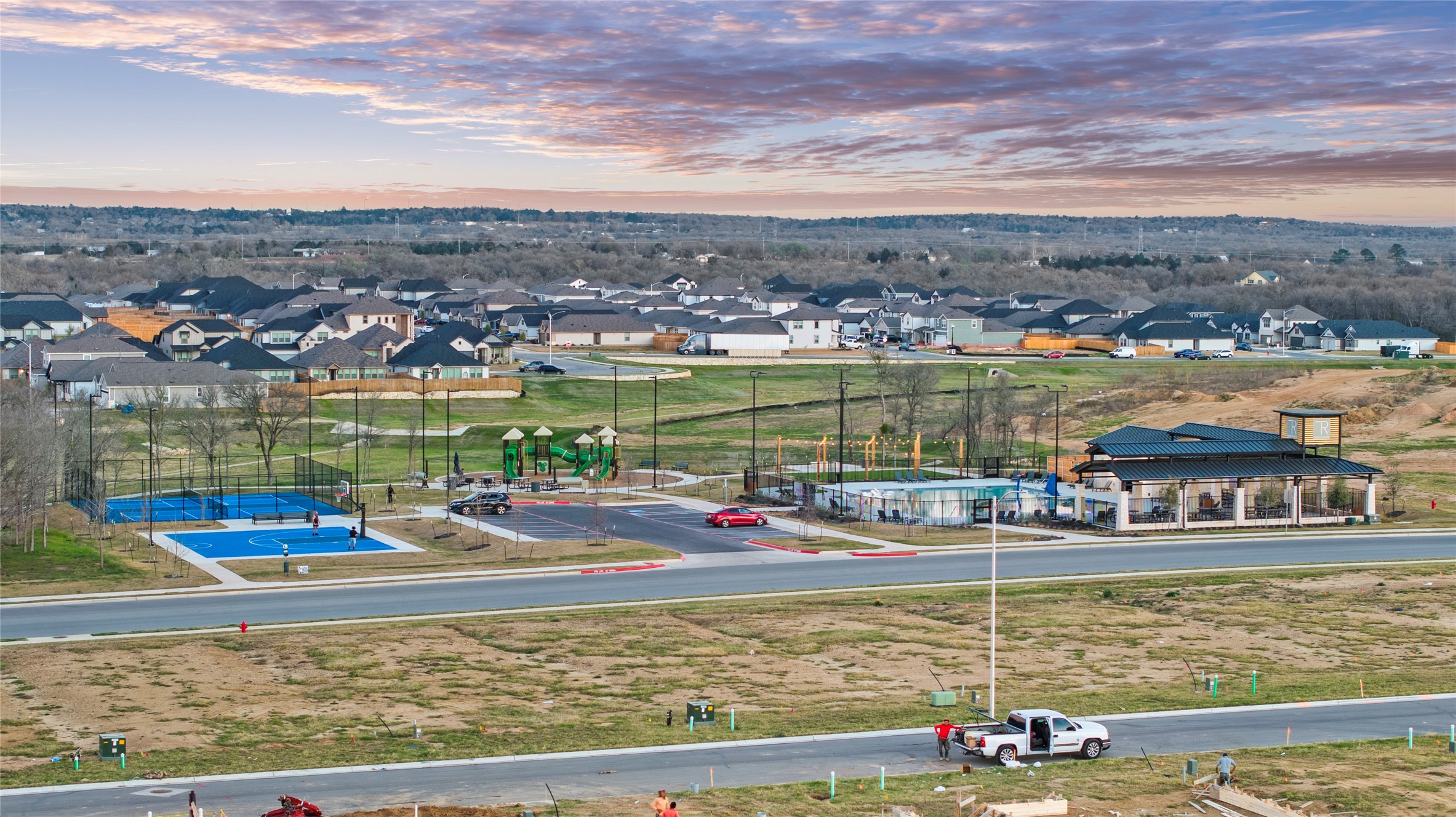 172 Gullivers Drive Elgin, TX 78621 - Photo 23 of 25 a view of a lake with a nearby beach