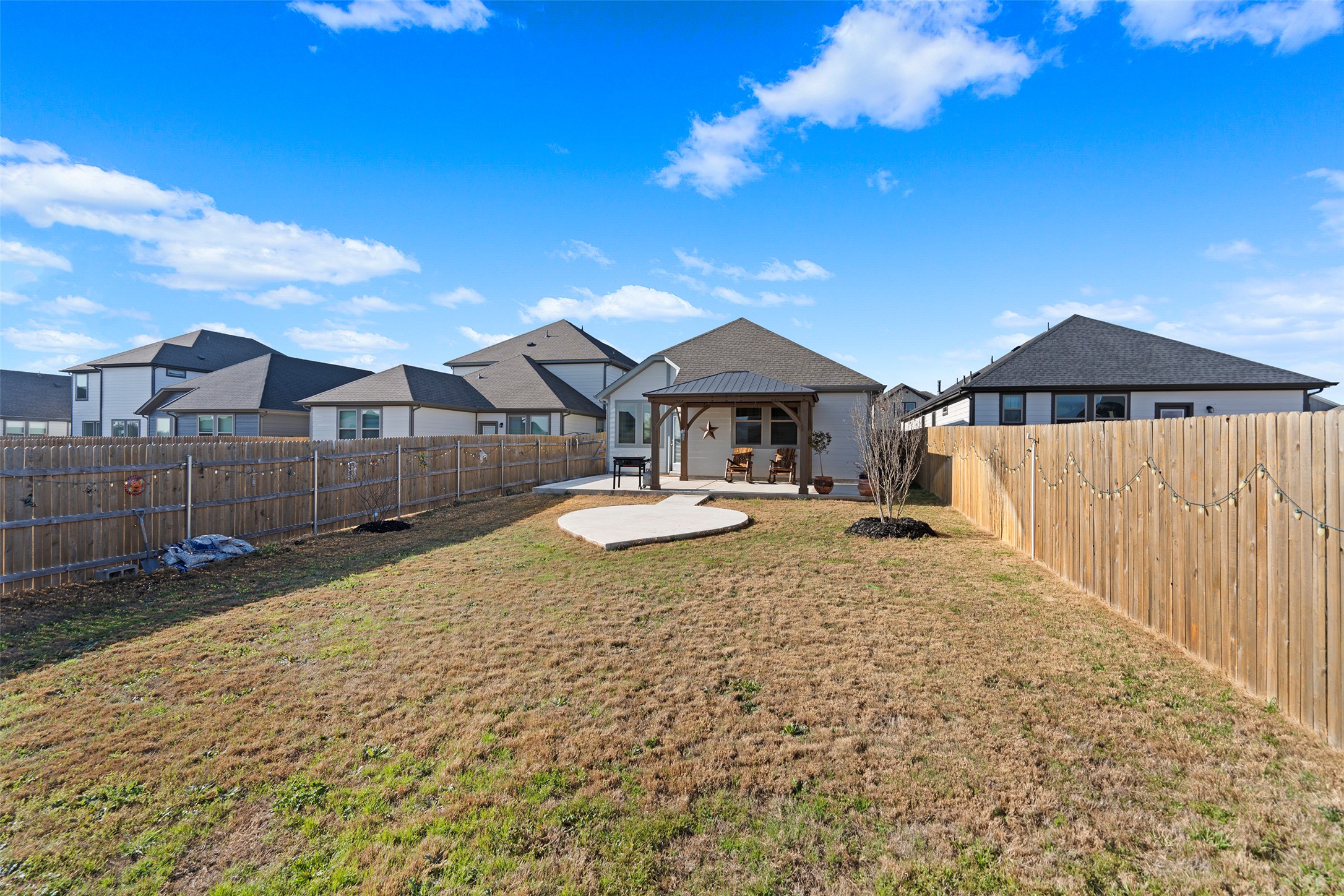172 Gullivers Drive Elgin, TX 78621 - Photo 10 of 25 a view of outdoor space yard and patio
