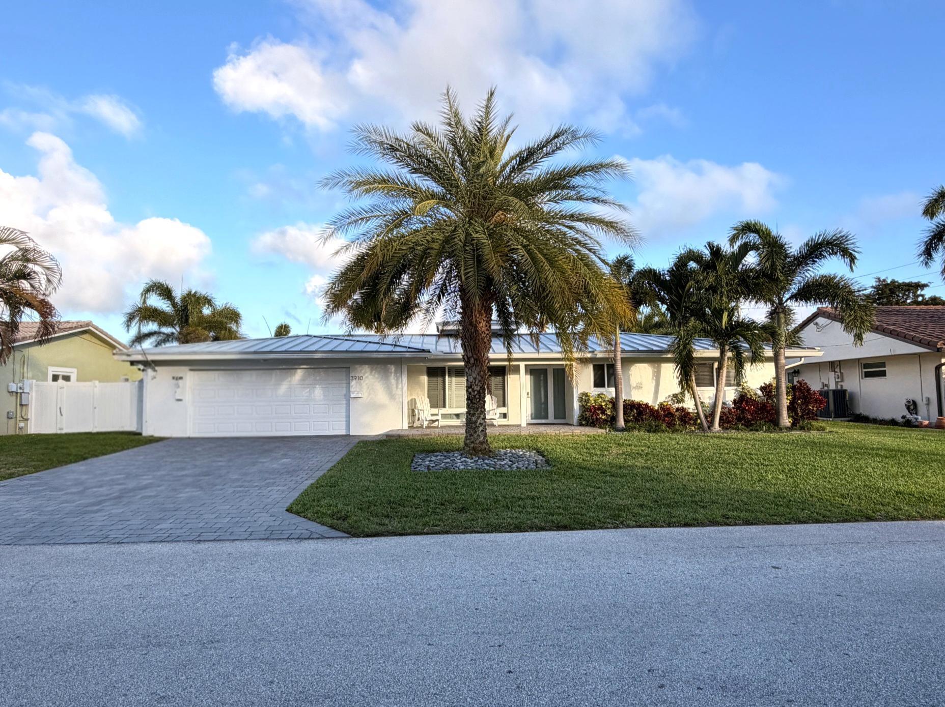 3910 Northeast 26th Avenue Lighthouse Point, FL 33064 - Photo 1 of 32 Front 5