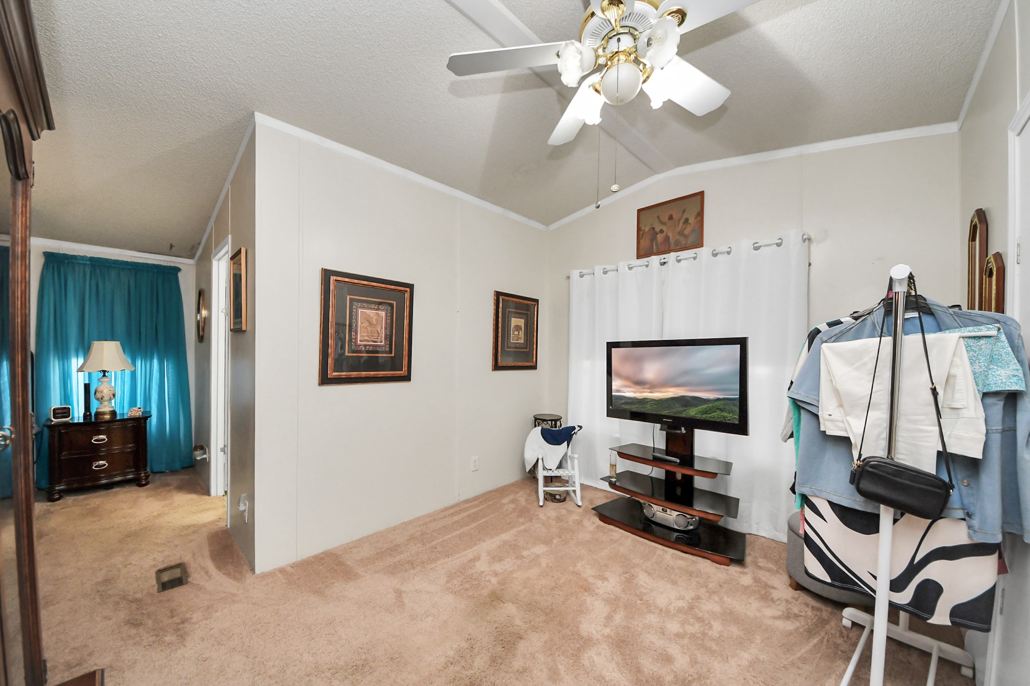 204 Edith Street Highlands, TX 77562 - Photo 10 of 33 a view of a livingroom with workspace and a window