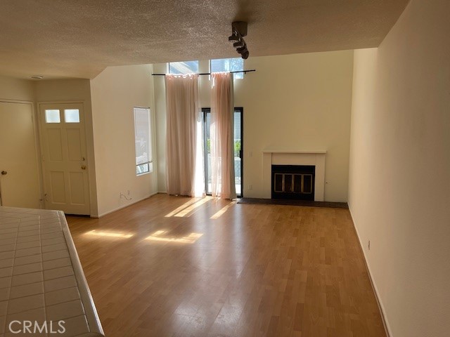 73 Fallingstar Irvine, CA 92614 - Photo 14 of 34 a view of a livingroom with a fireplace