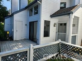 73 Fallingstar Irvine, CA 92614 - Photo 2 of 34 a view of a brick house with a car parked front of it
