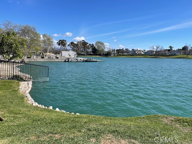73 Fallingstar Irvine, CA 92614 - Photo 27 of 34 a view of a lake with houses in the back