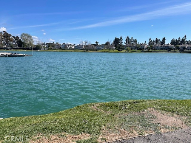 73 Fallingstar Irvine, CA 92614 - Photo 28 of 34 a view of a lake with houses in the back