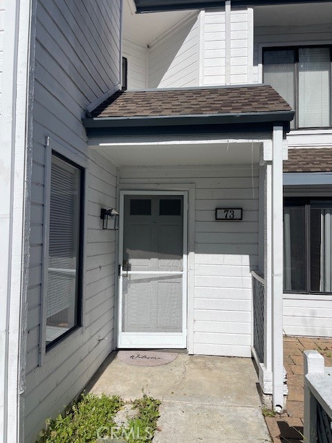 73 Fallingstar Irvine, CA 92614 - Photo 3 of 34 a front view of a house with a garage