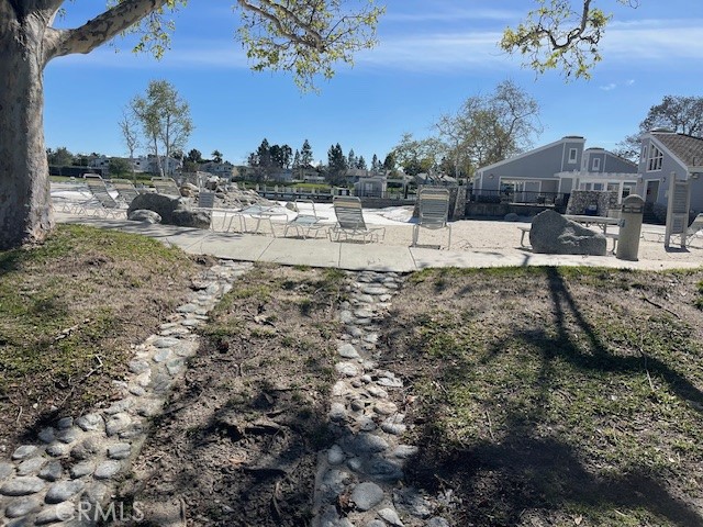 73 Fallingstar Irvine, CA 92614 - Photo 34 of 34 a view of a houses with a yard