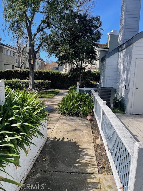 73 Fallingstar Irvine, CA 92614 - Photo 7 of 34 a view of a pathway along with potted plants