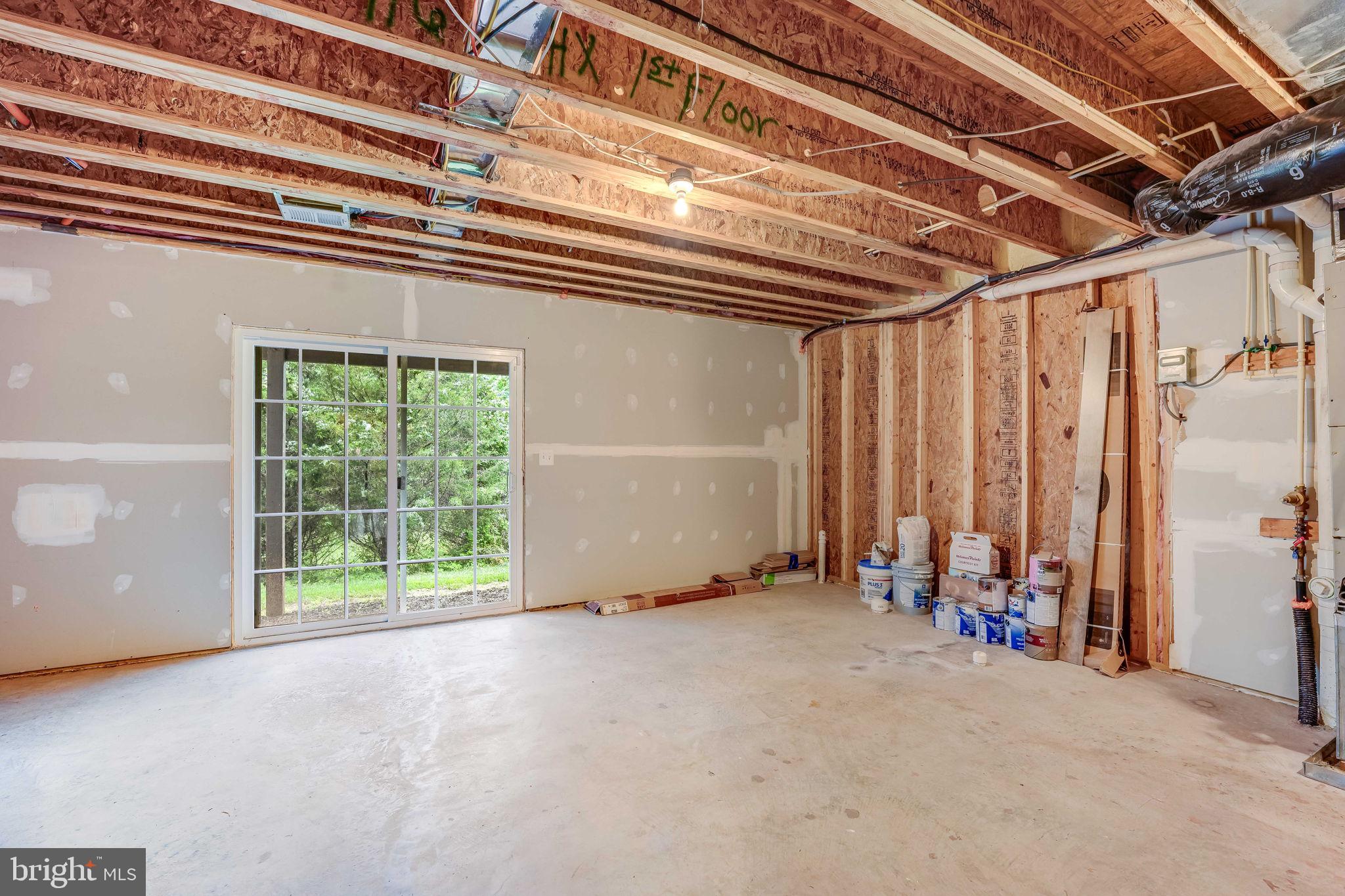 8360 Scotland Loop Manassas, VA 20109 - Photo 26 of 32 Lower Level Unfinished Rec Room