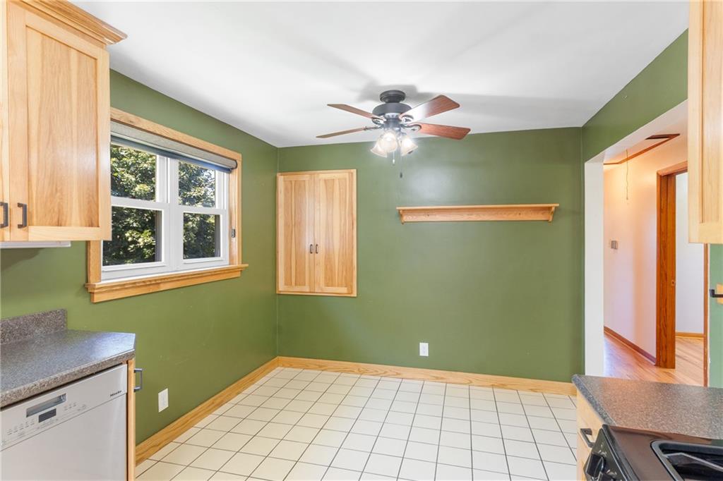 1017 Silver Lane McKees Rocks, PA 15136 - Photo 12 of 34 a view of an empty room with a window and a kitchen