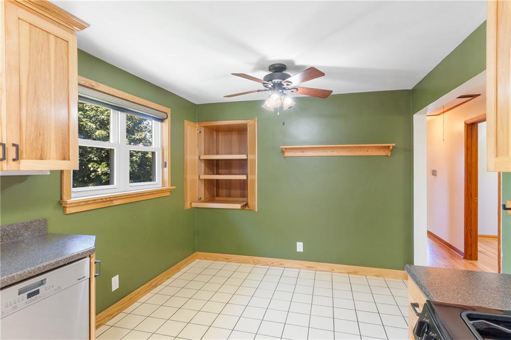1017 Silver Lane McKees Rocks, PA 15136 - Photo 13 of 34 a view of an empty room with a window and a kitchen
