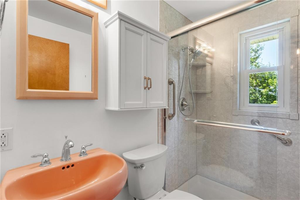 1017 Silver Lane McKees Rocks, PA 15136 - Photo 20 of 34 a bathroom with a sink a toilet and shower