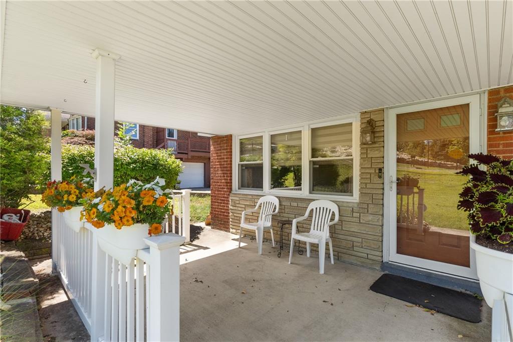 1017 Silver Lane McKees Rocks, PA 15136 - Photo 3 of 34 a front view of a house with outdoor seating