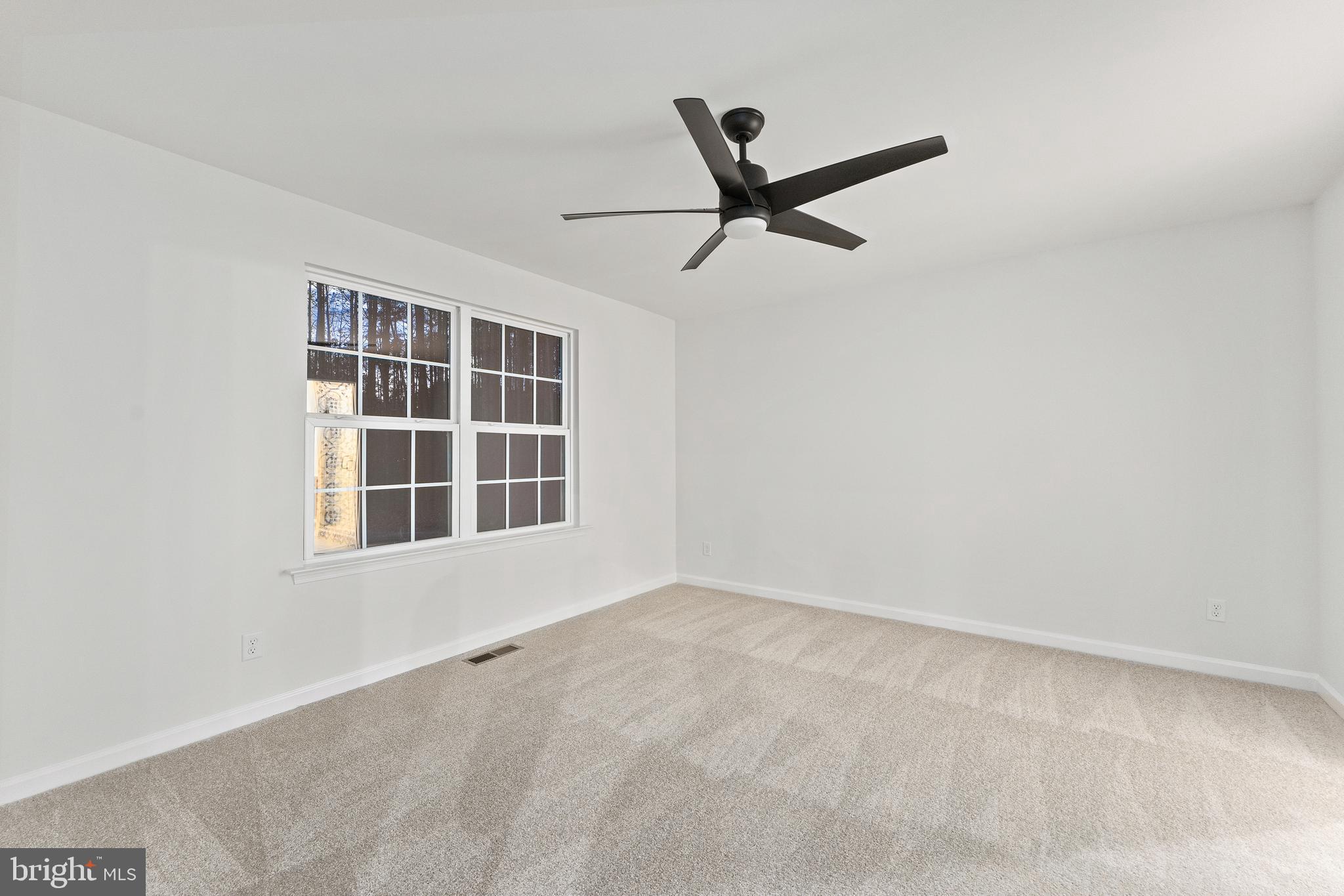 1080 Eastham Road Bumpass, VA 23024 - Photo 14 of 43 a view of empty room with windows