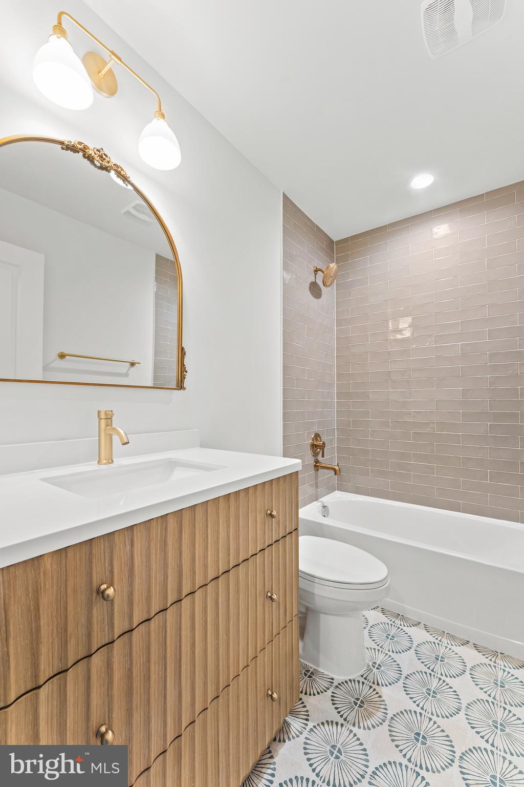 1080 Eastham Road Bumpass, VA 23024 - Photo 22 of 43 a bathroom with a sink a toilet and shower