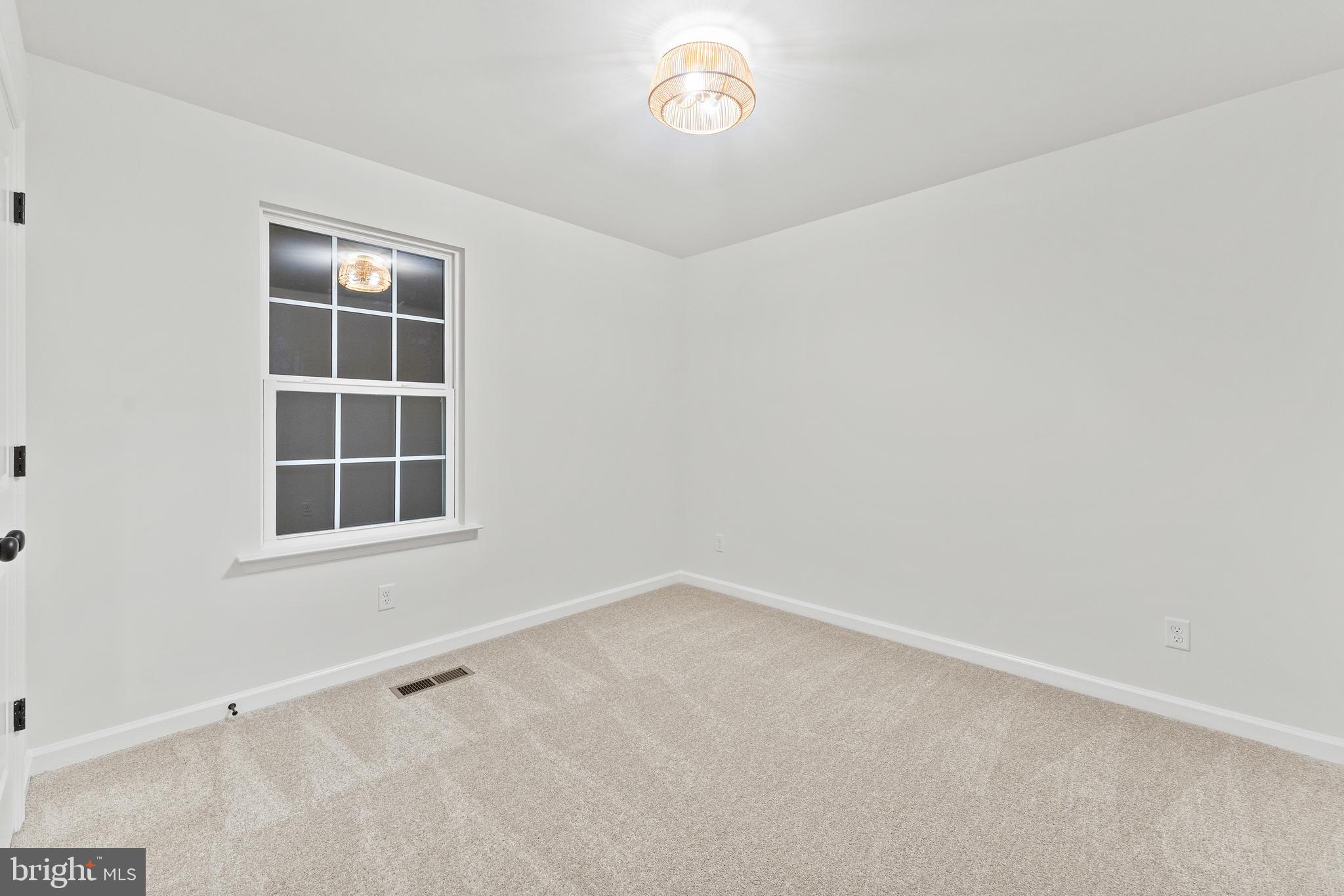 1080 Eastham Road Bumpass, VA 23024 - Photo 23 of 43 an empty room with a window
