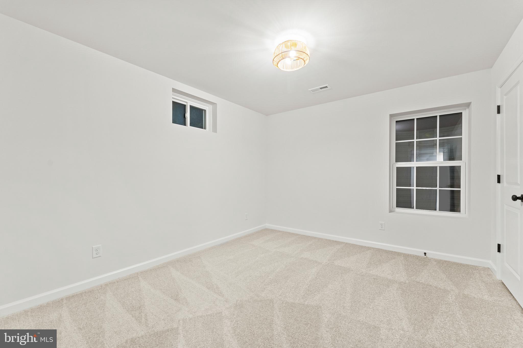 1080 Eastham Road Bumpass, VA 23024 - Photo 25 of 43 an empty room with a window