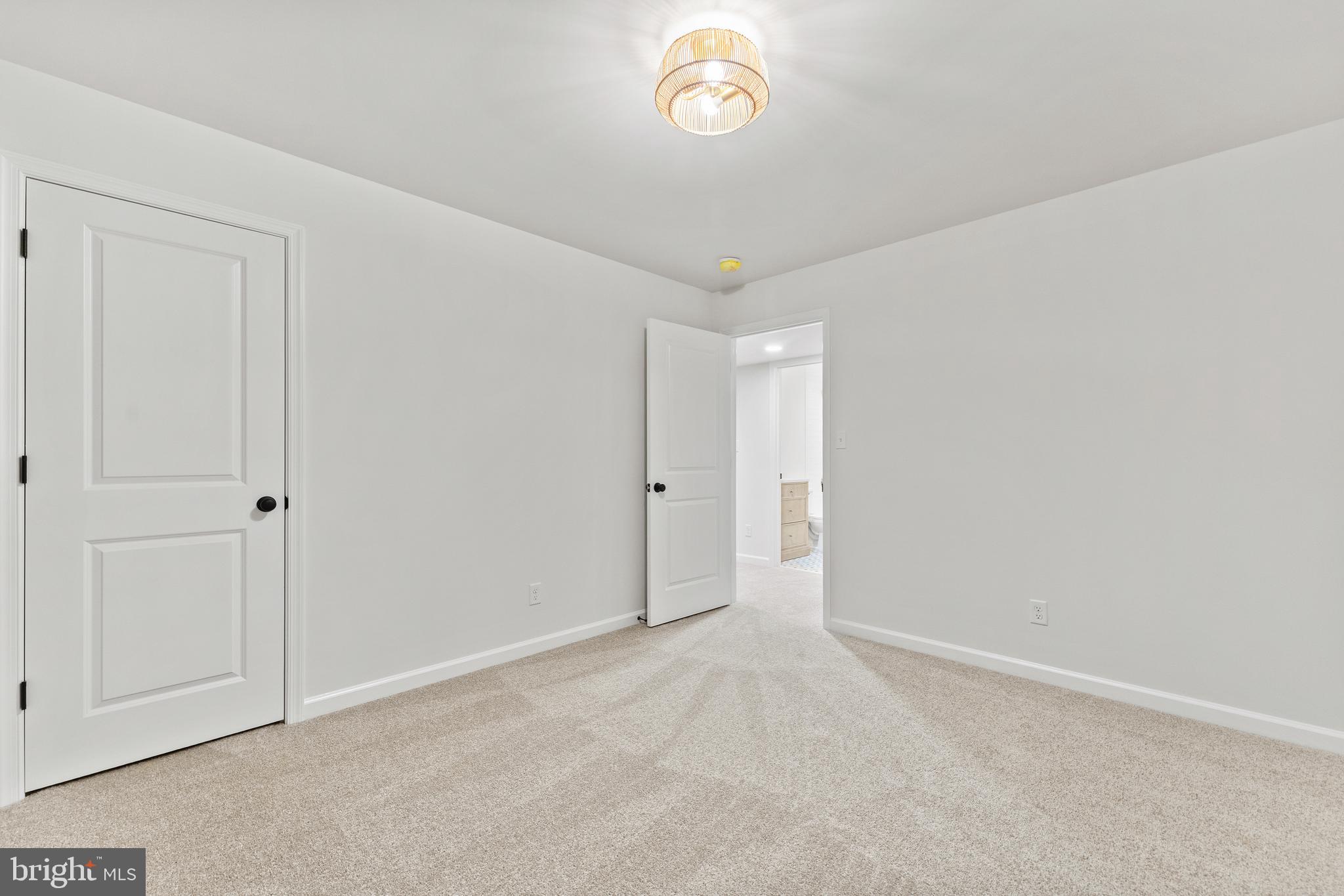 1080 Eastham Road Bumpass, VA 23024 - Photo 26 of 43 a view of an empty room and a window