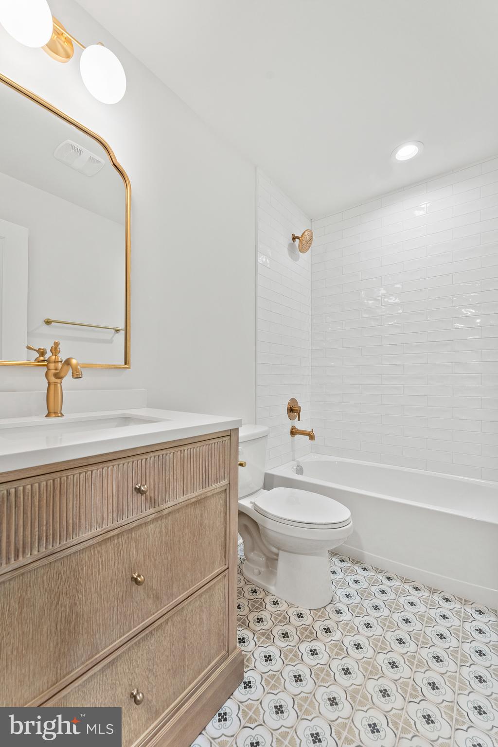 1080 Eastham Road Bumpass, VA 23024 - Photo 29 of 43 a bathroom with a toilet a sink and a bathtub