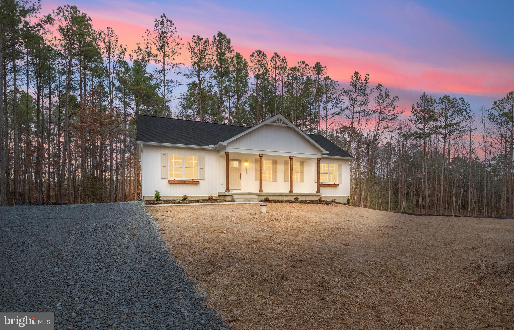 1080 Eastham Road Bumpass, VA 23024 - Photo 40 of 43 a view of large trees with a big yard and large trees