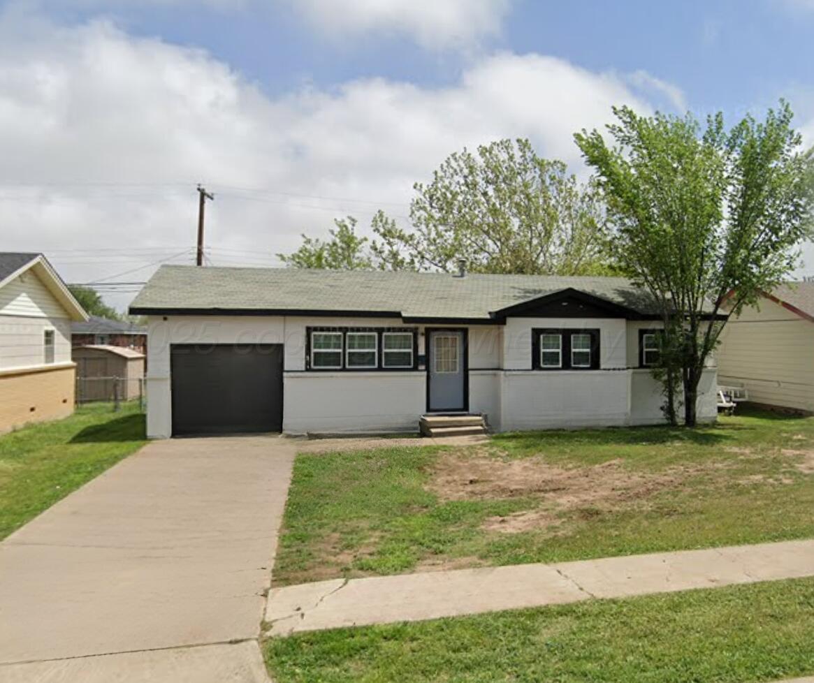 0 Portfolio Package Amarillo, TX 79110 - Photo 14 of 17 a front view of house with yard and trees in the background