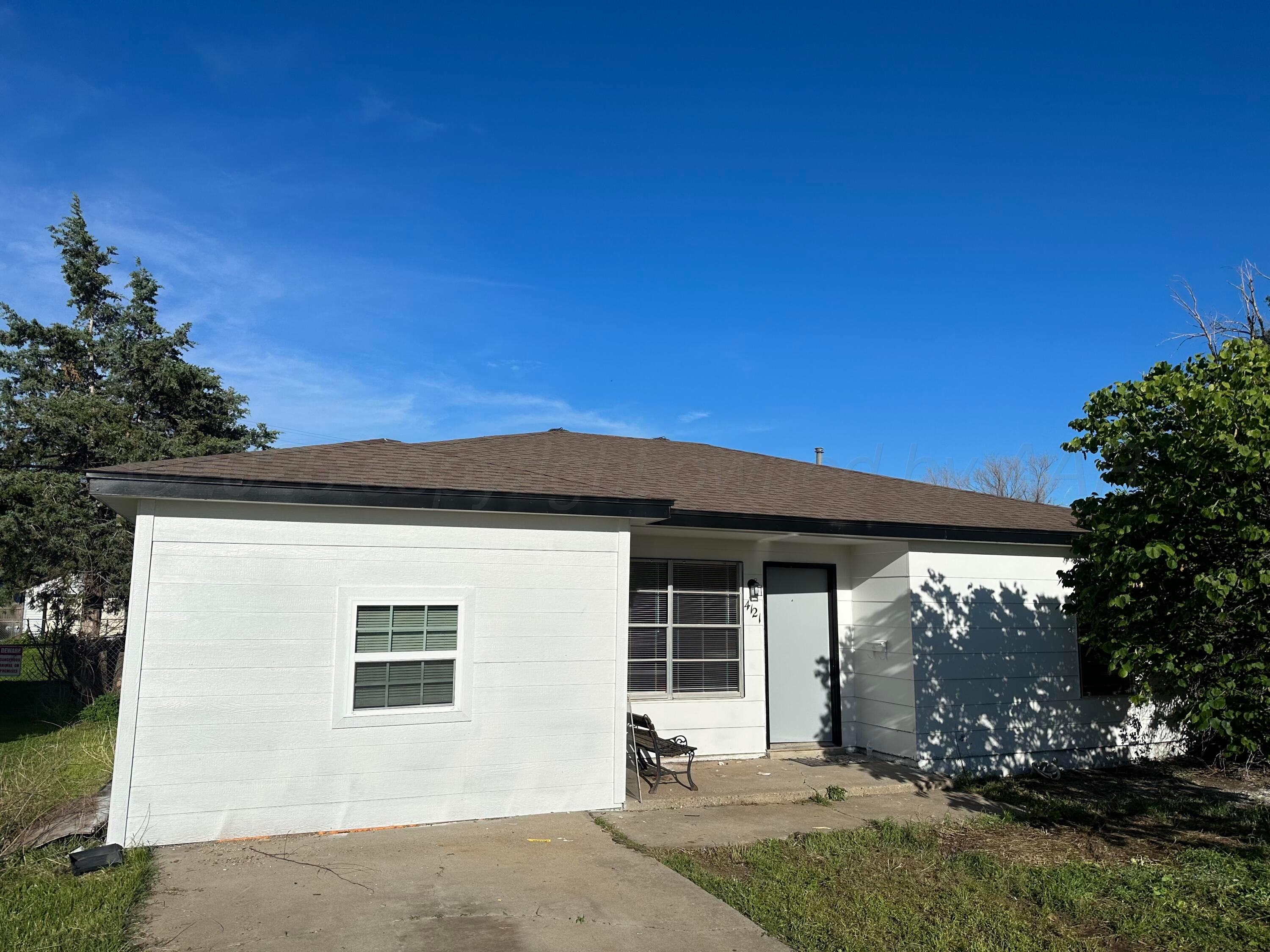 0 Portfolio Package Amarillo, TX 79110 - Photo 3 of 17 a front view of a house with garden