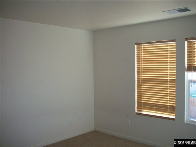 9275 Red Baron Boulevard Reno, NV 89506 - Photo 2 of 9 a view of an empty room with a window