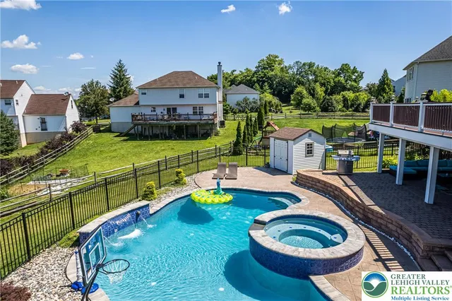 a stove top oven sitting inside of a kitchen