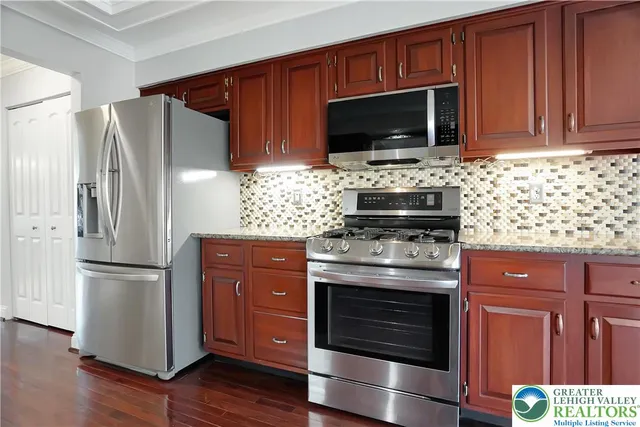 a living room with a fireplace and a window