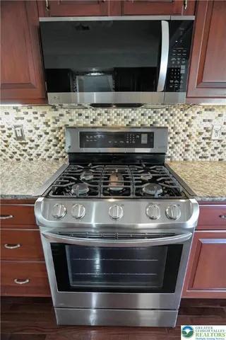 a bathroom with a toilet and a sink