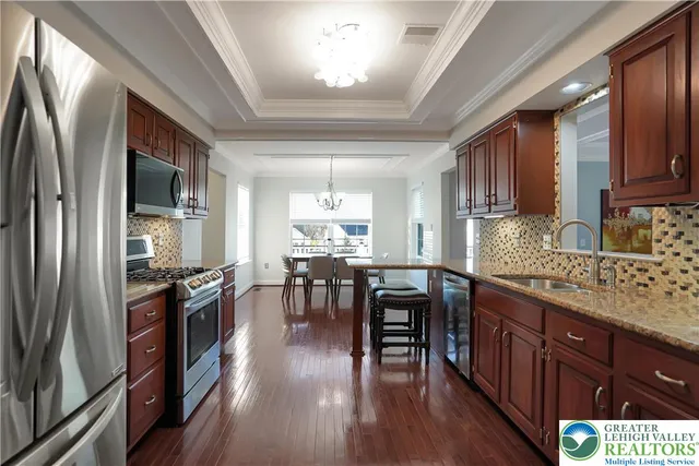 a bedroom with a bed and a lamp on table