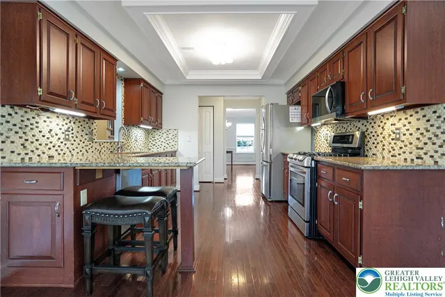 a white bath tub sitting next to a window