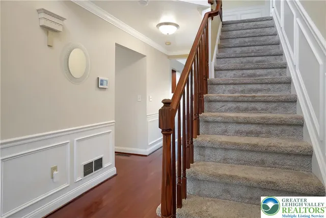 a view of a chairs and table in a room