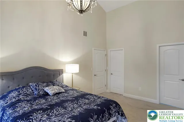 a view of a chair and tables in the balcony