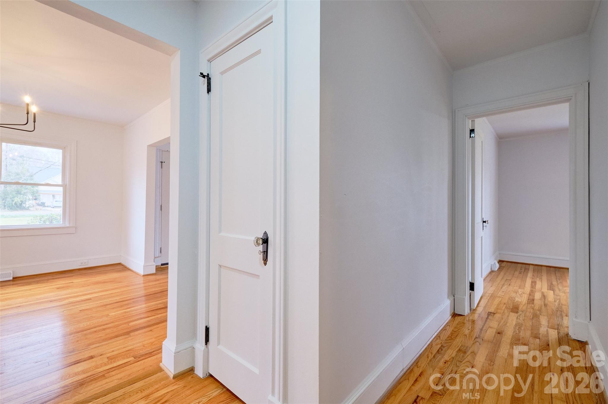 804 Congress Street North York, SC 29745 - Photo 18 of 48 a view of a hallway with wooden floor and a bathroom