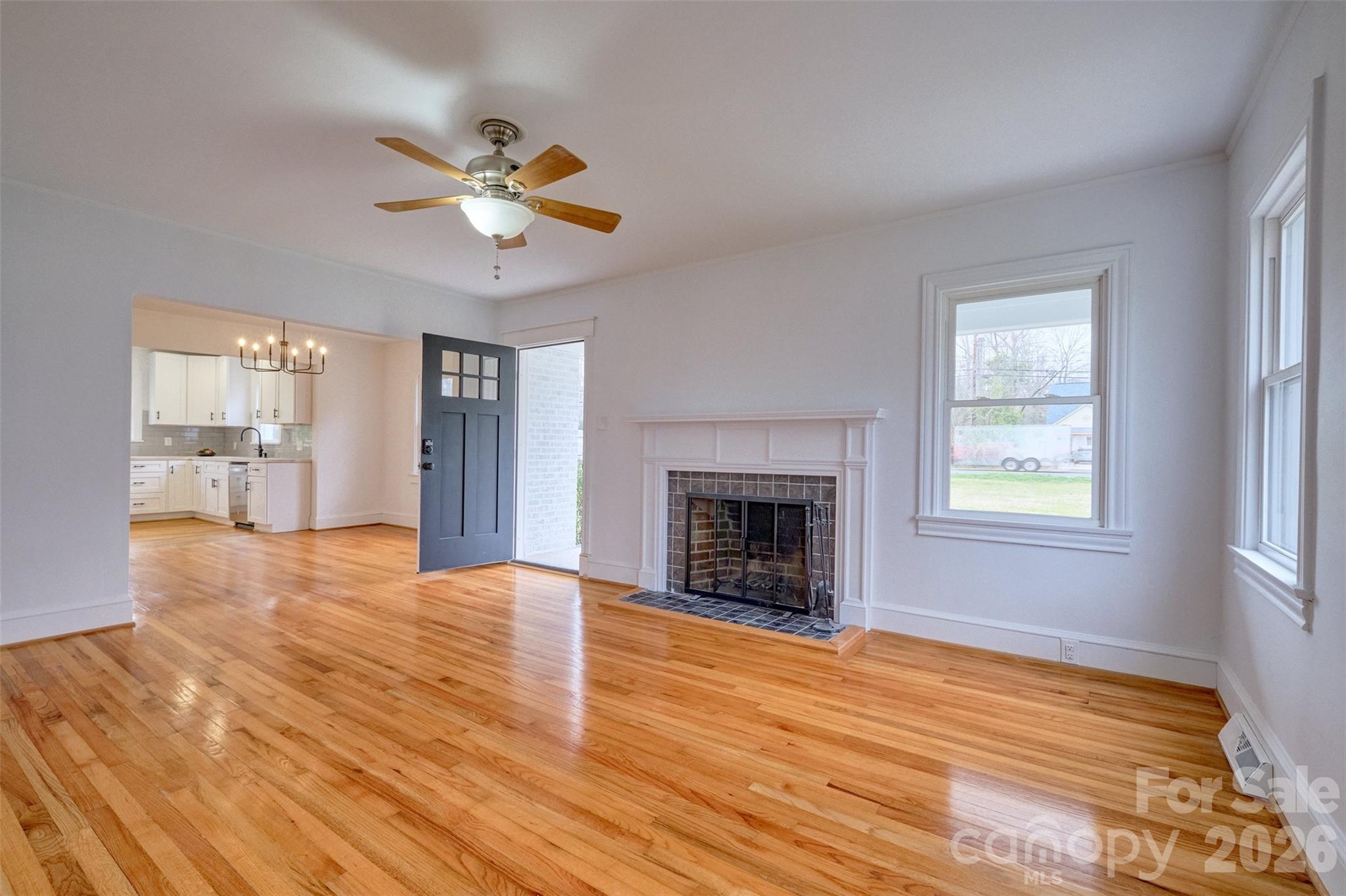 804 Congress Street North York, SC 29745 - Photo 4 of 48 a view of empty room with wooden floor and fan
