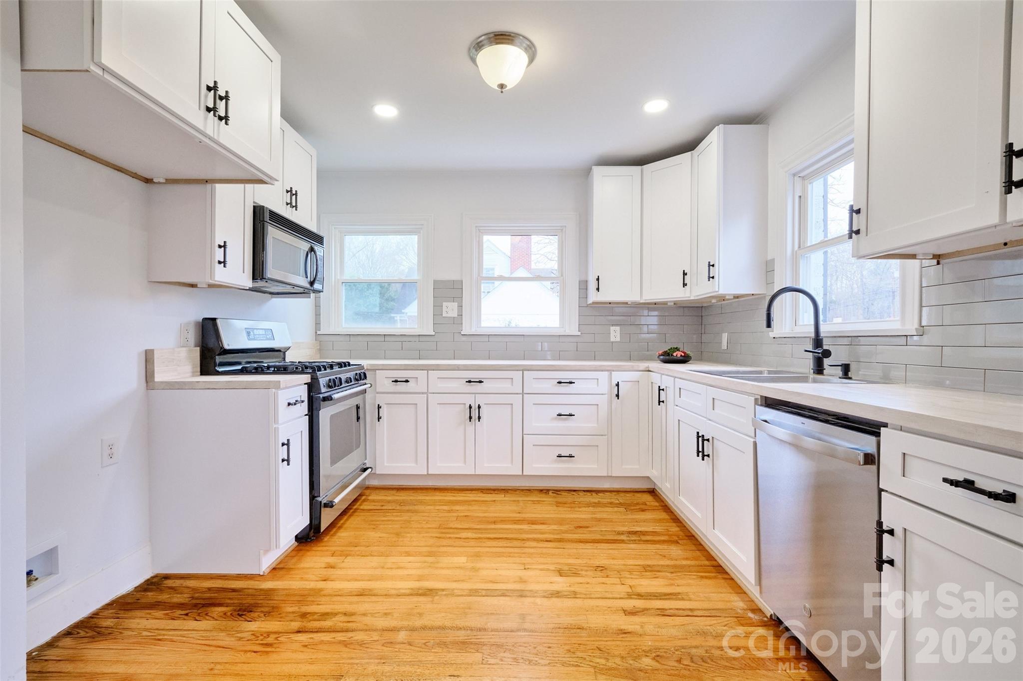 804 Congress Street North York, SC 29745 - Photo 9 of 48 a kitchen with stainless steel appliances granite countertop a sink and cabinets